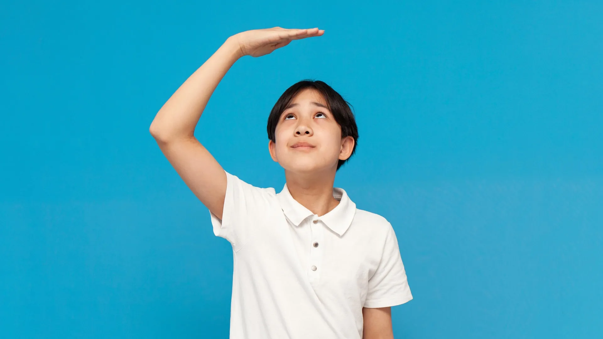 asian-boy-measures-height-with-hand-1 Asian Financial Crisis Stunted a Generation